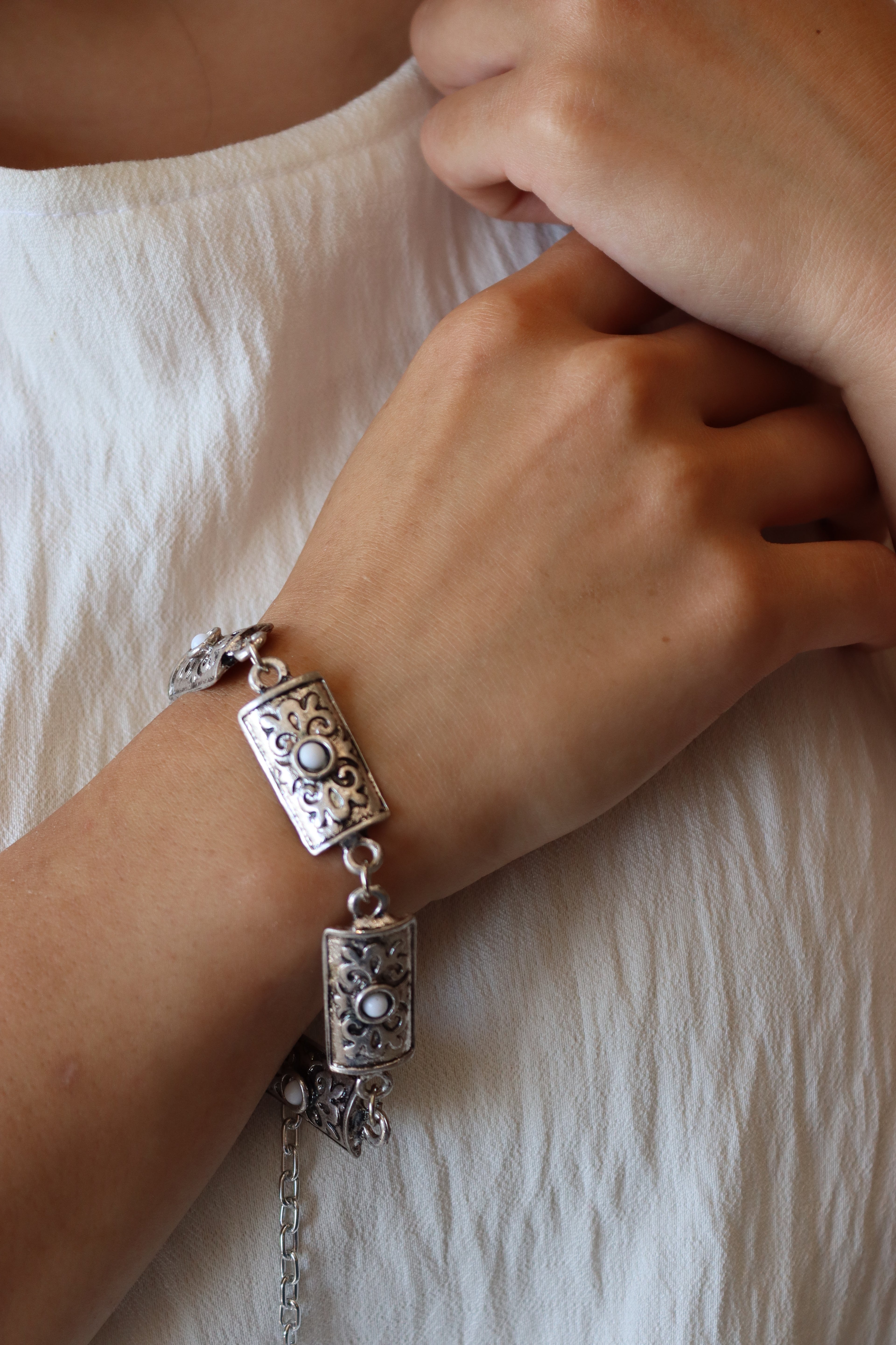 Whispers of Turath white Linked