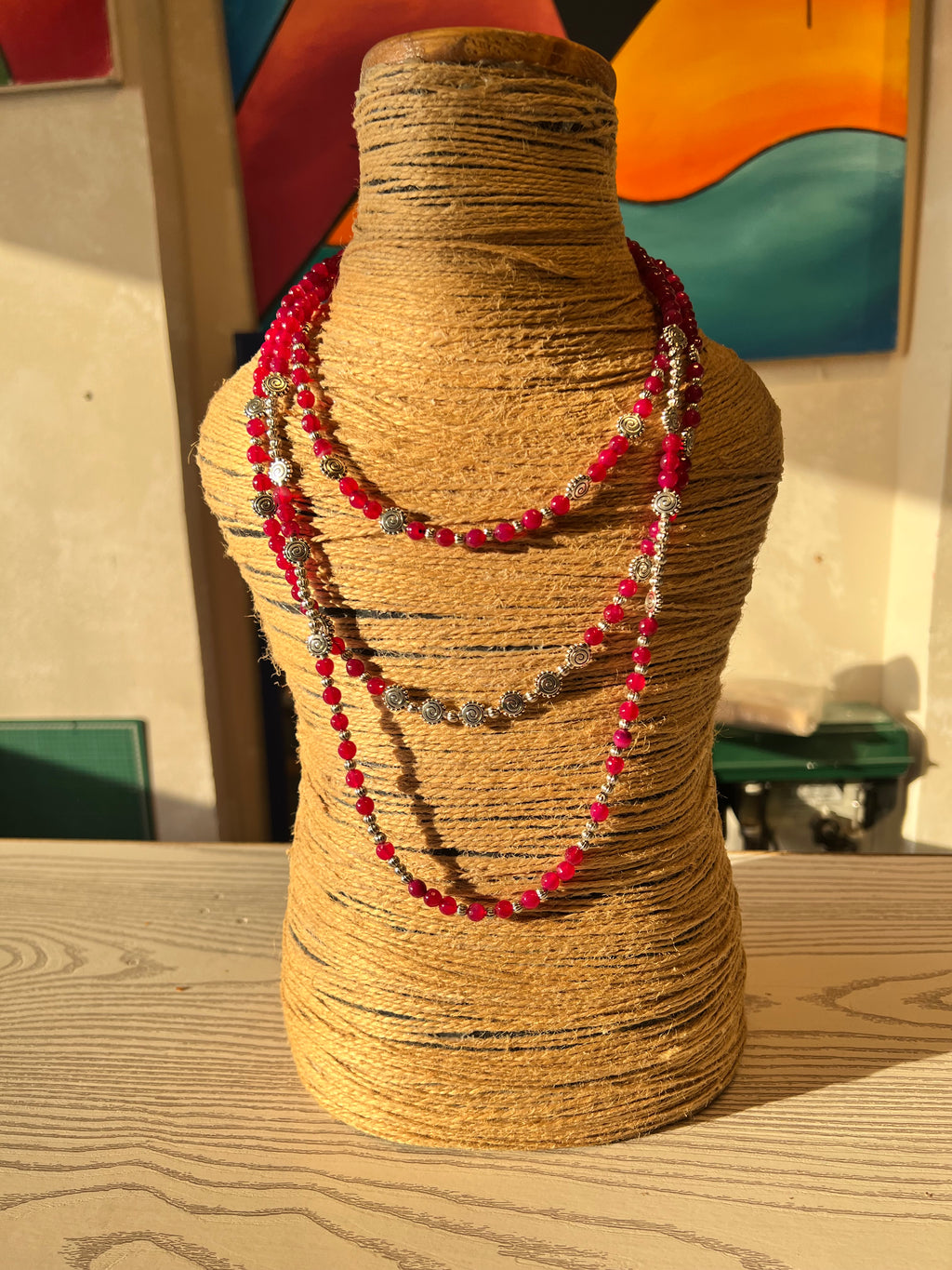 layered pink agate necklace with silver metal