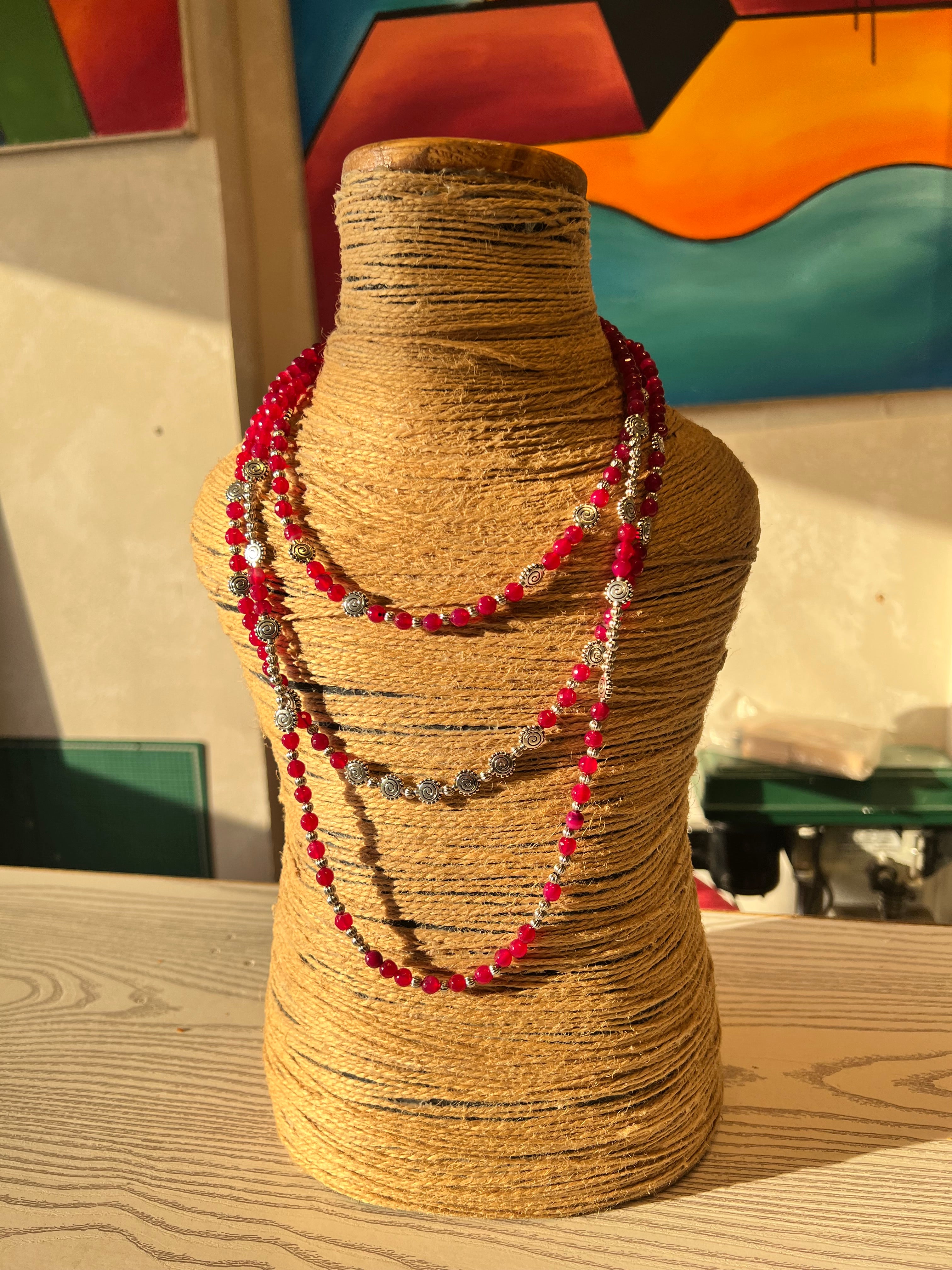 layered pink agate necklace with silver metal