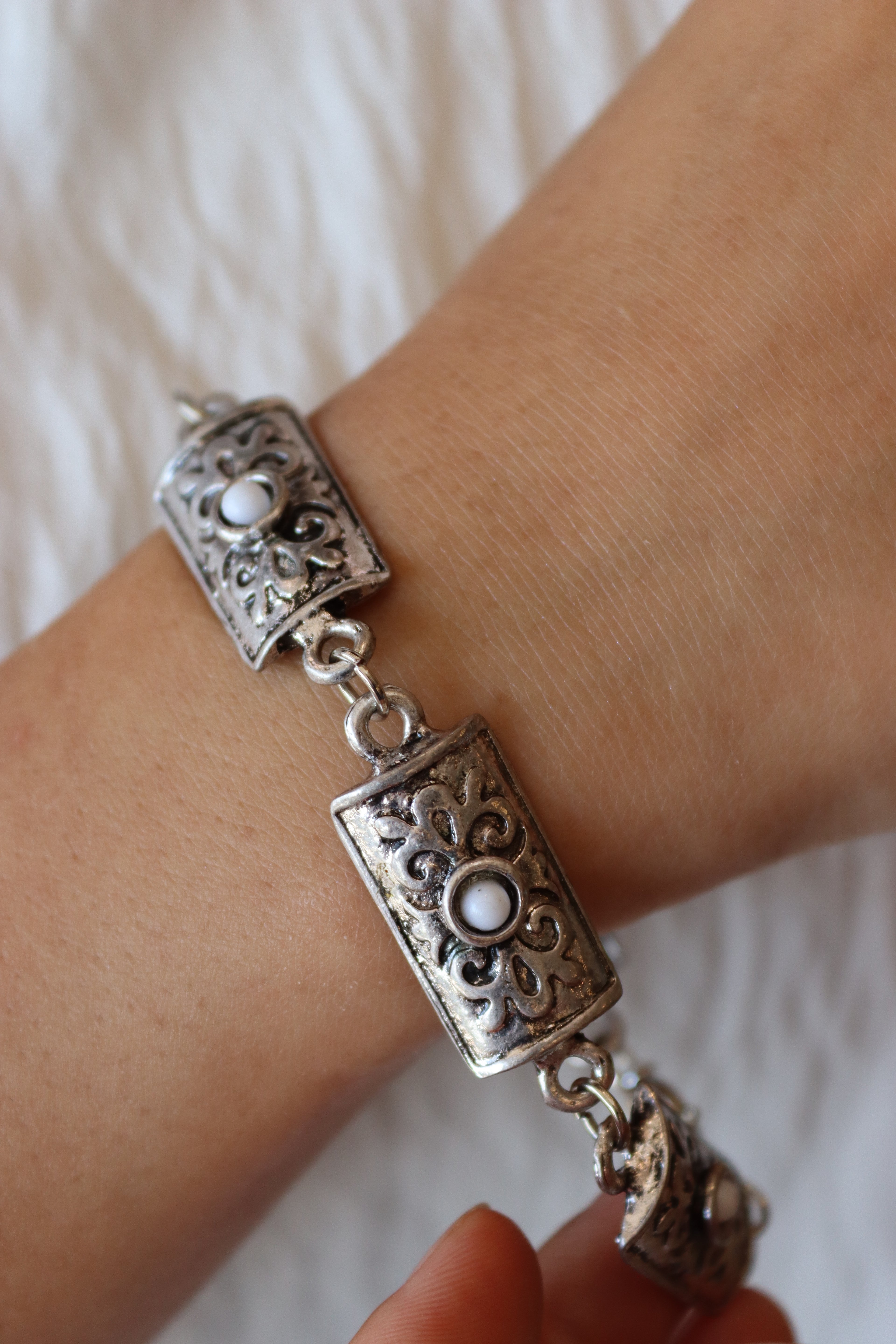 Whispers of Turath white Linked