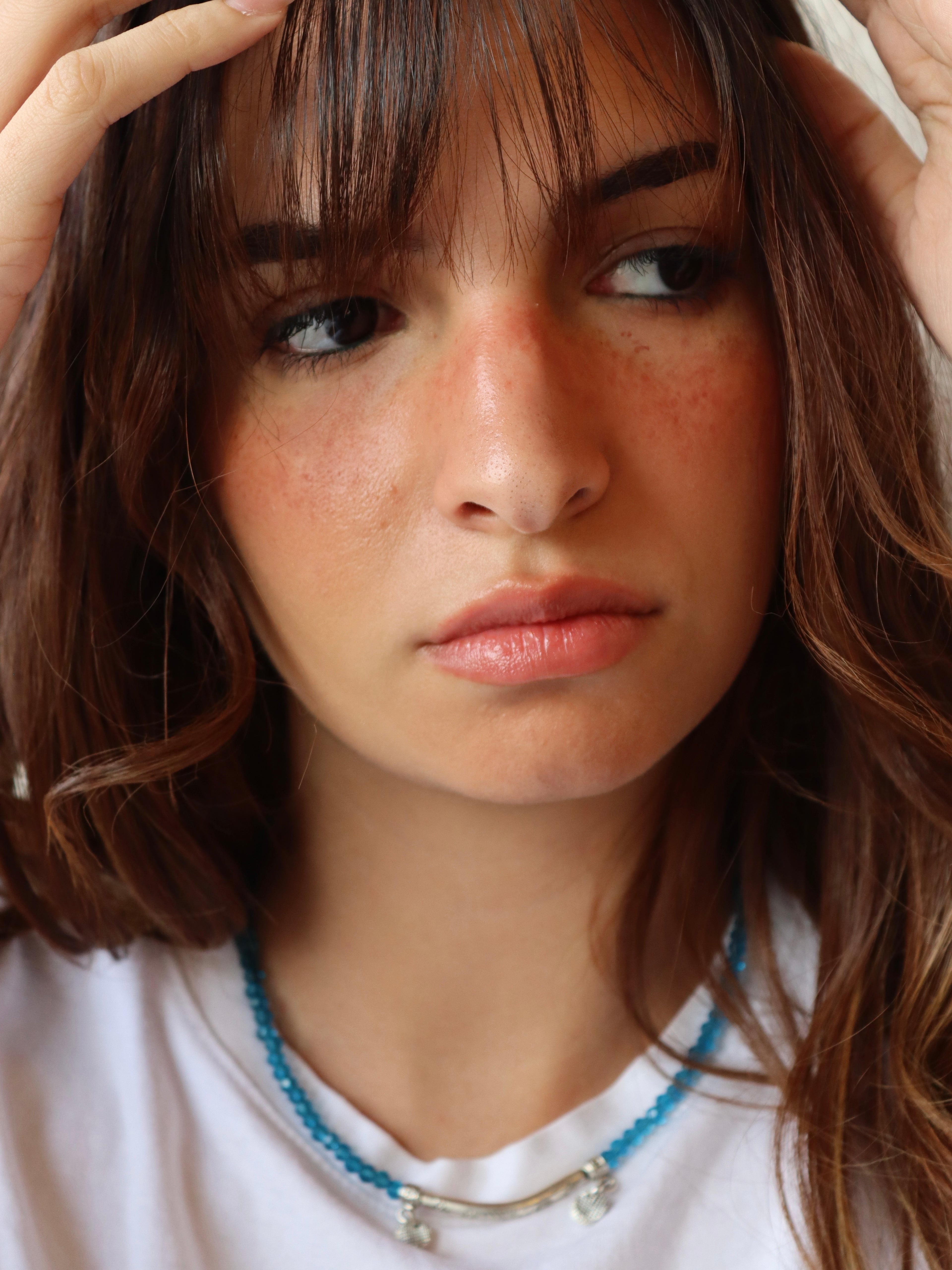 blue crystal layered necklace with silver metal