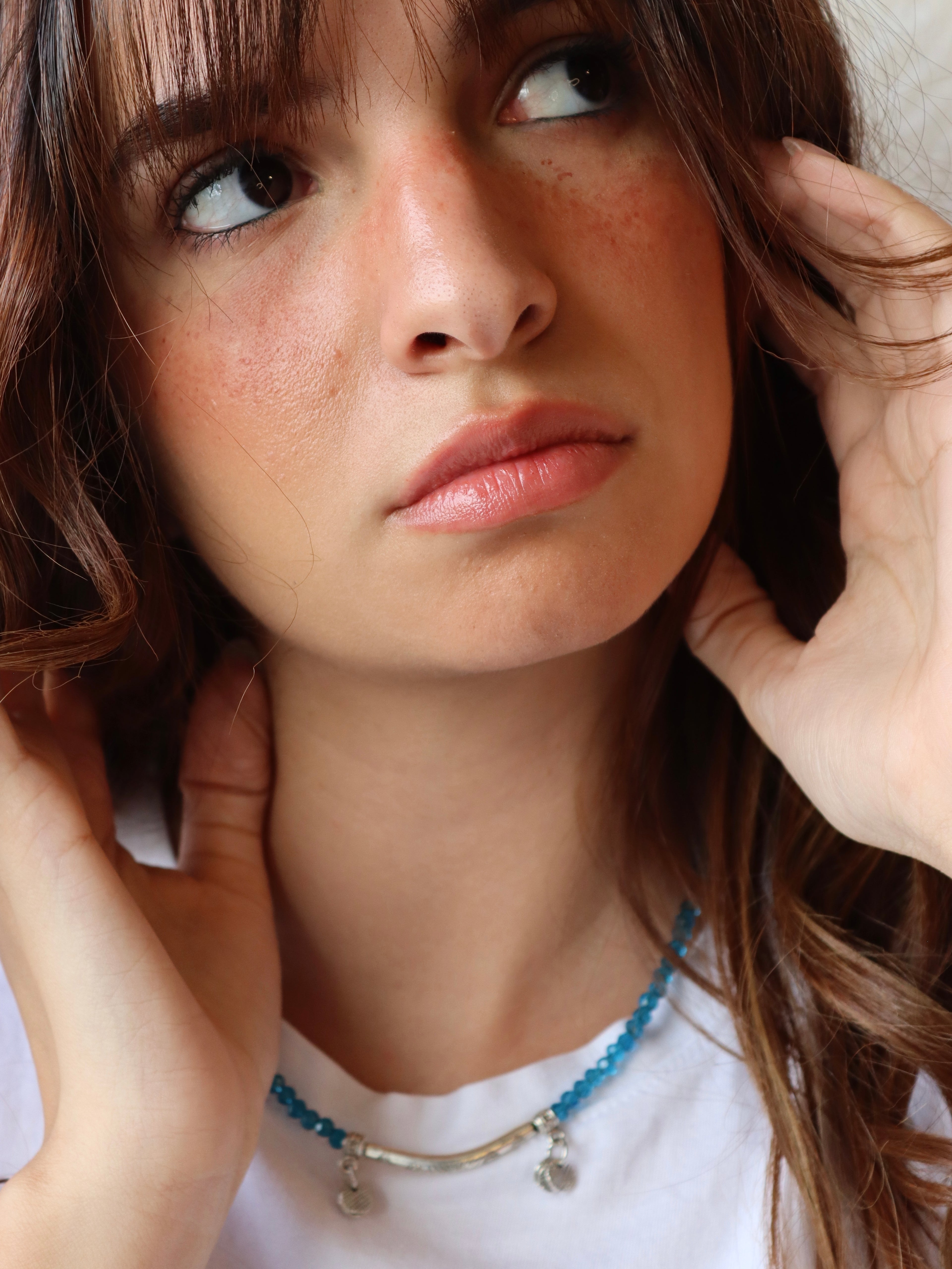 blue crystal layered necklace with silver metal