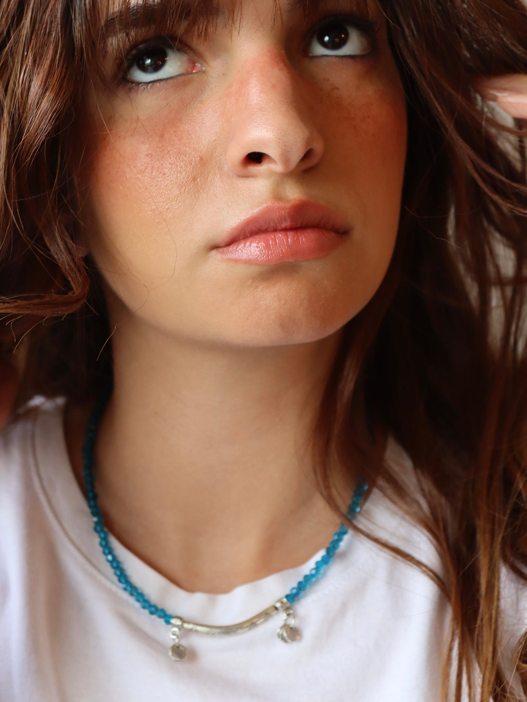 blue crystal layered necklace with silver metal