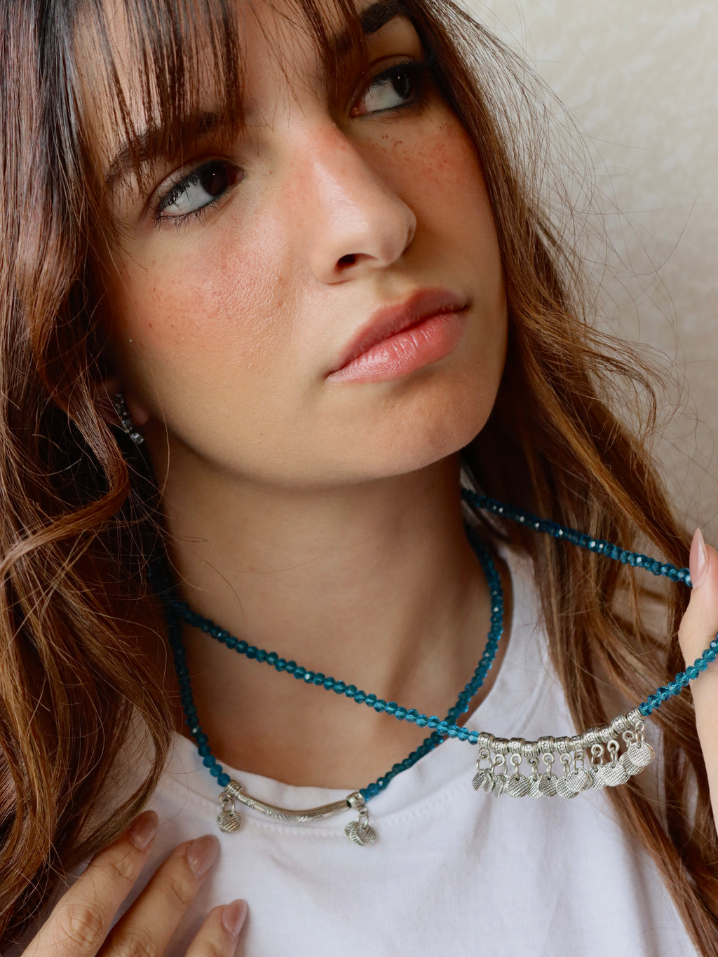 blue crystal layered necklace with silver metal