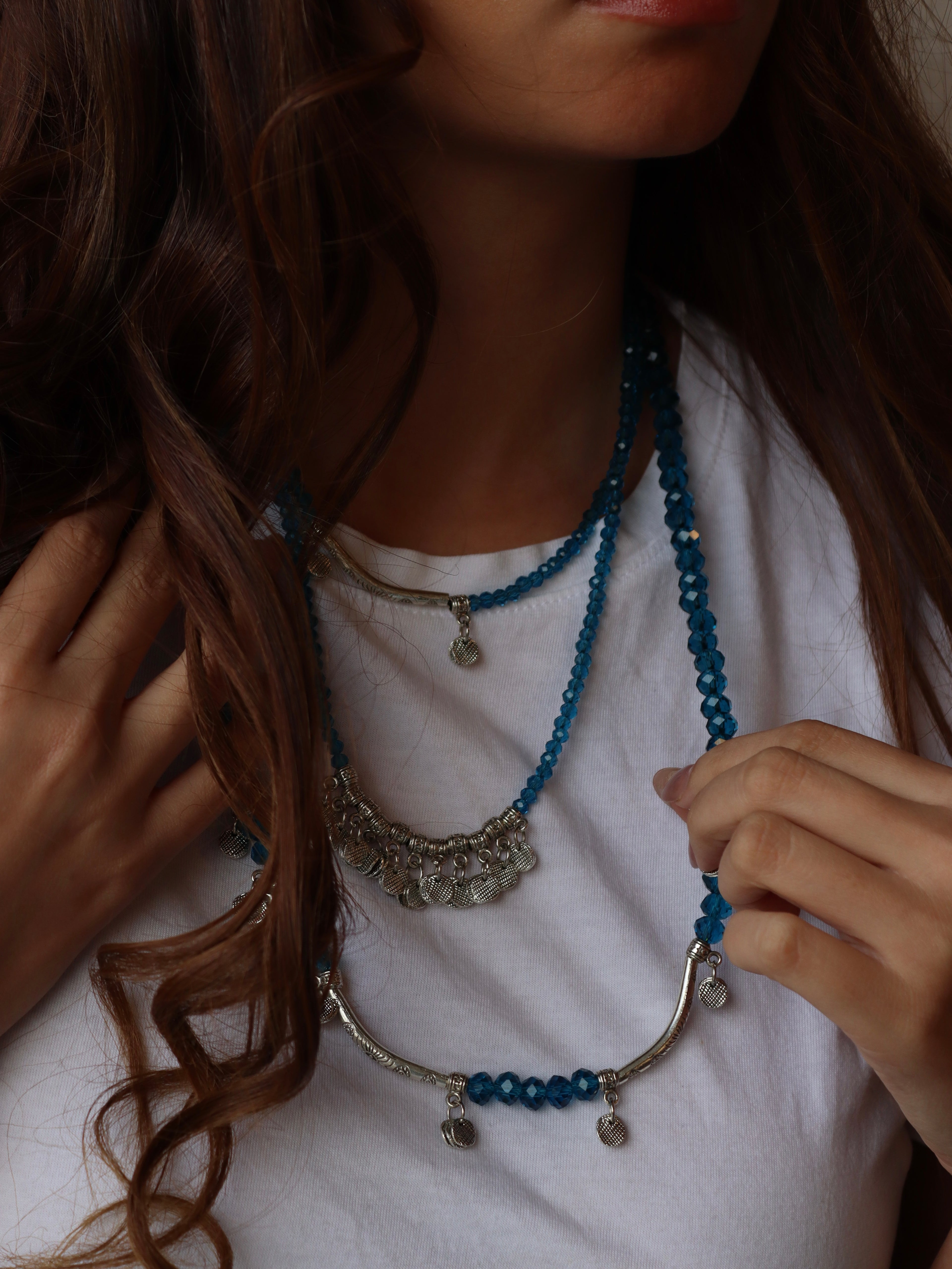 blue crystal layered necklace with silver metal