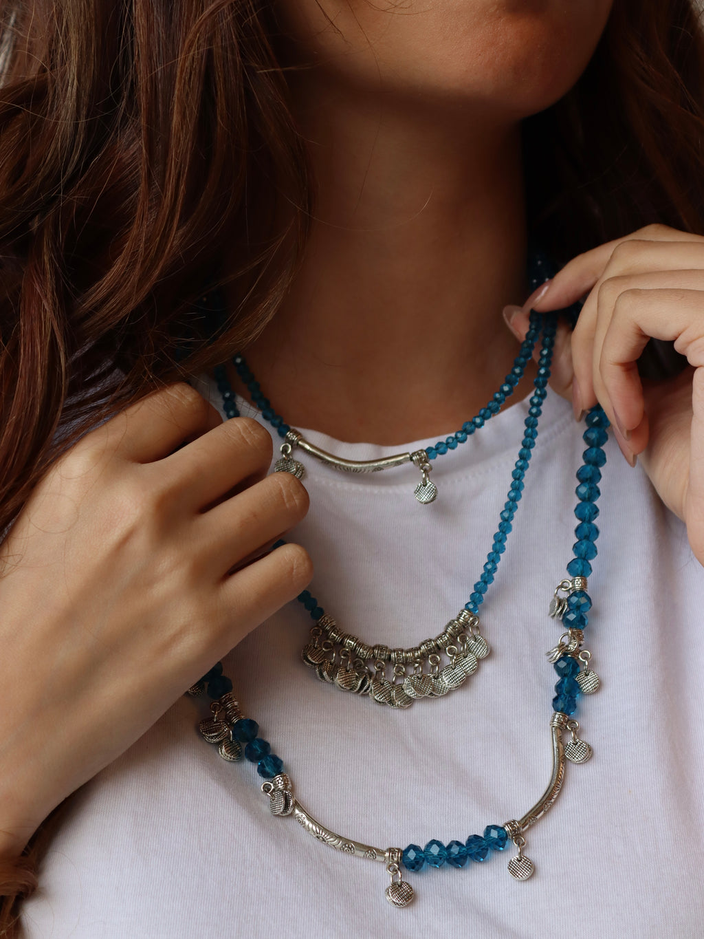 blue crystal layered necklace with silver metal