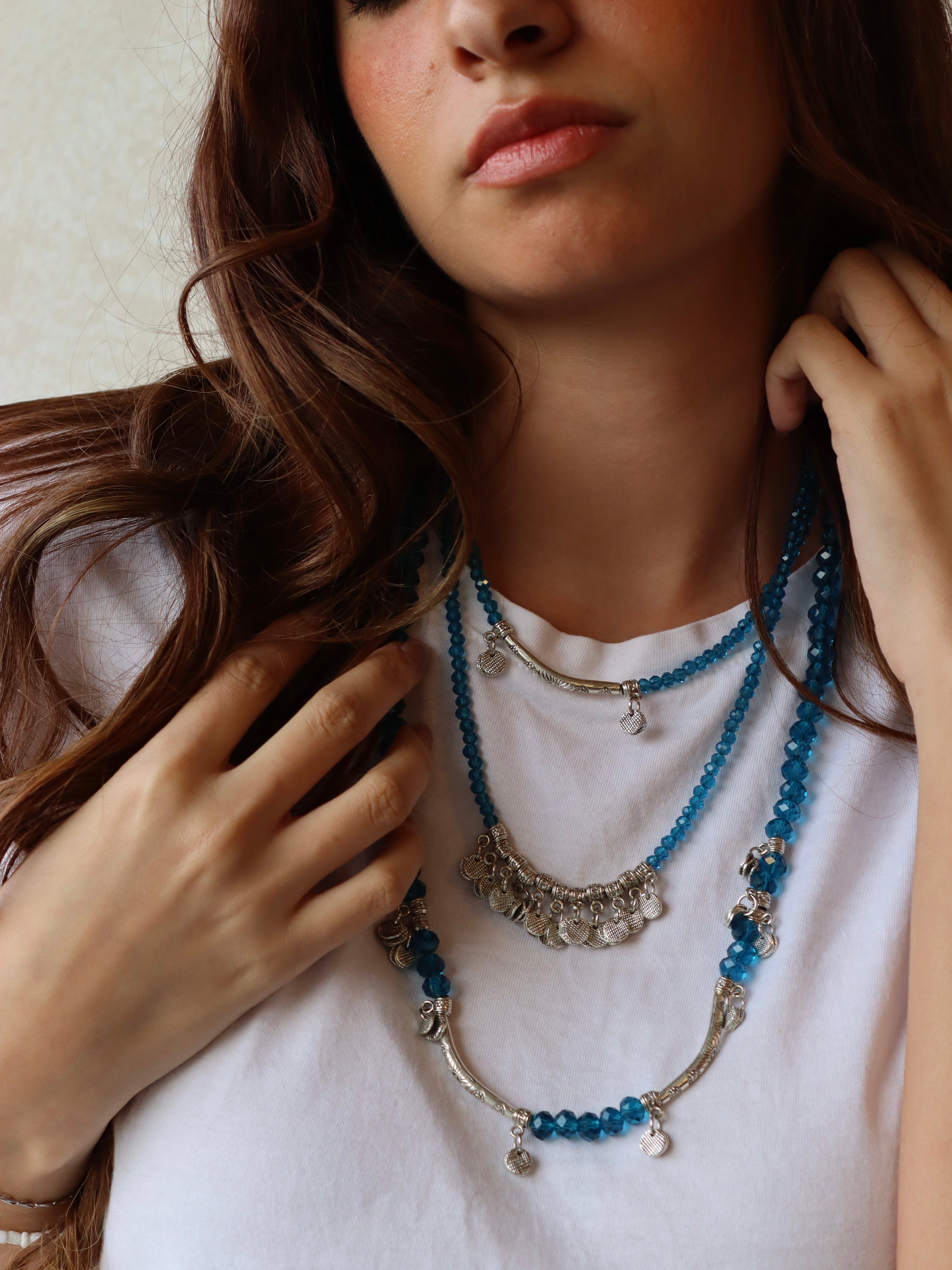 blue crystal layered necklace with silver metal