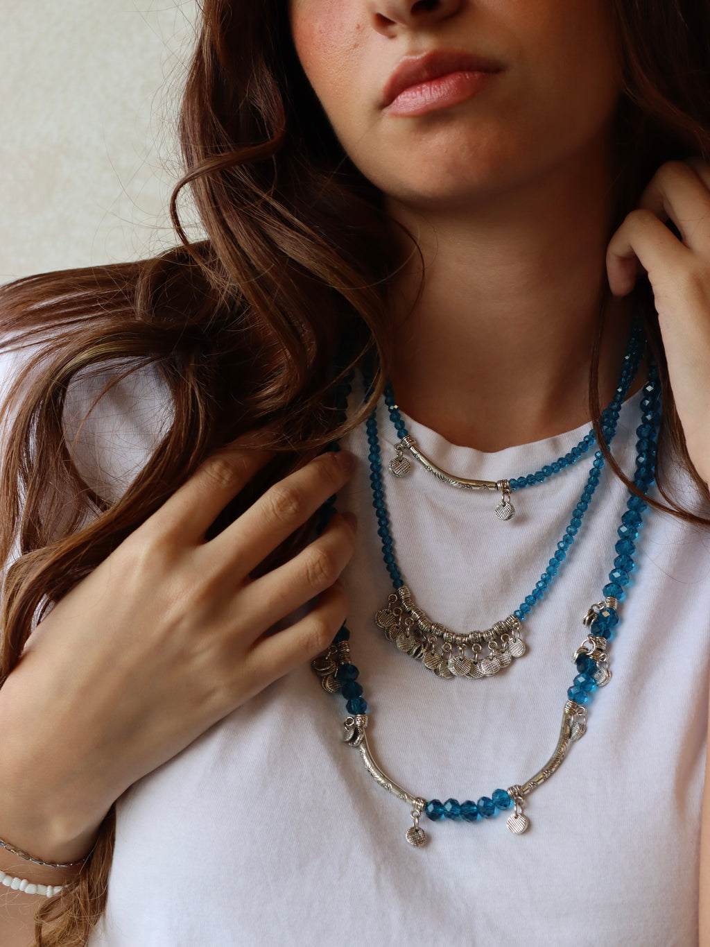 blue crystal layered necklace with silver metal