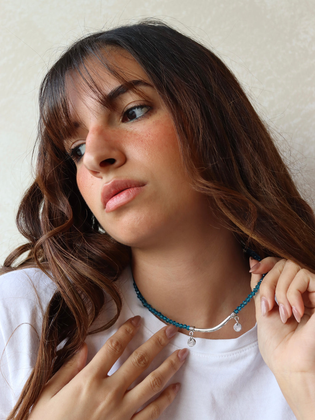 blue crystal layered necklace with silver metal