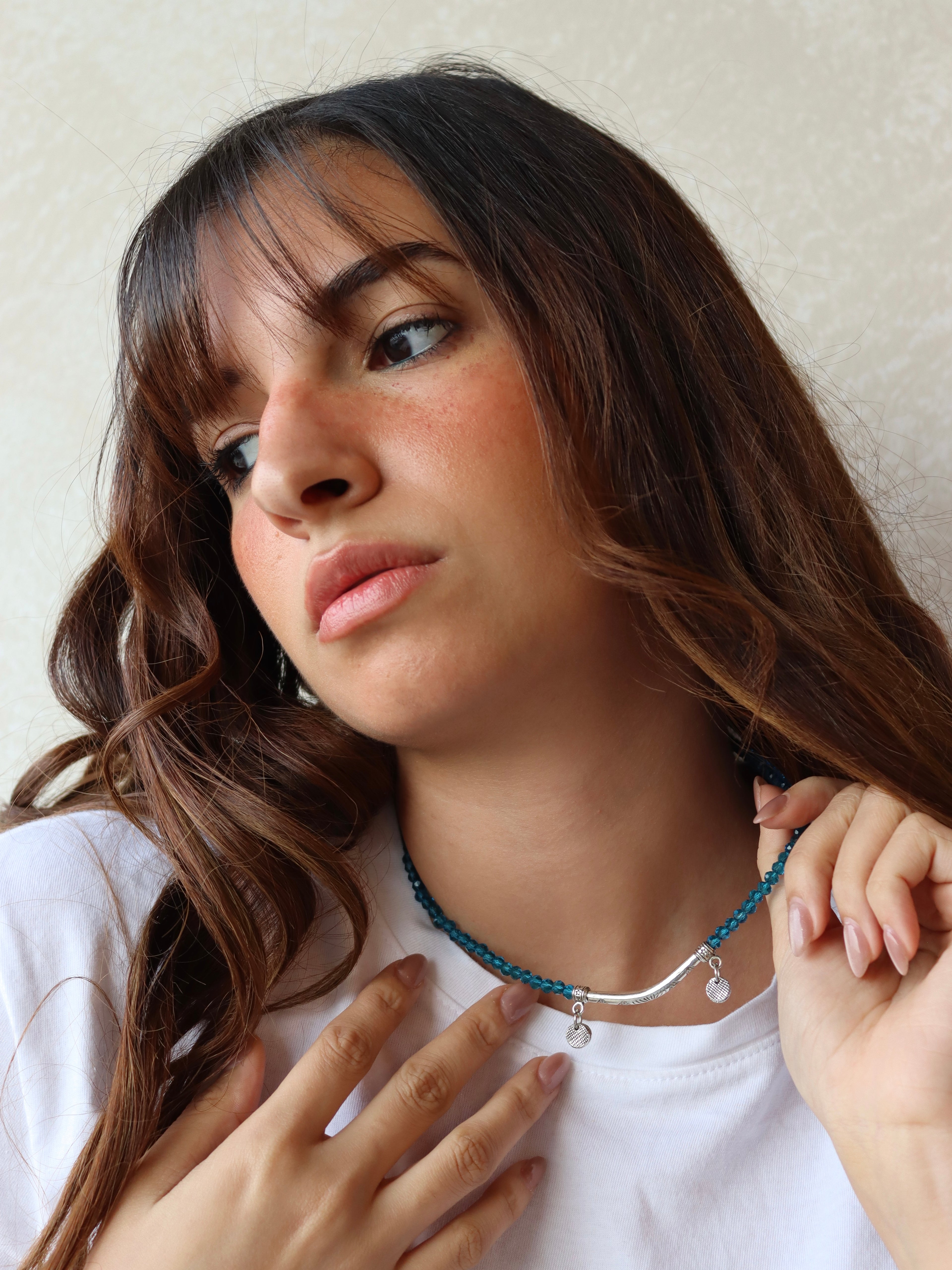 blue crystal layered necklace with silver metal