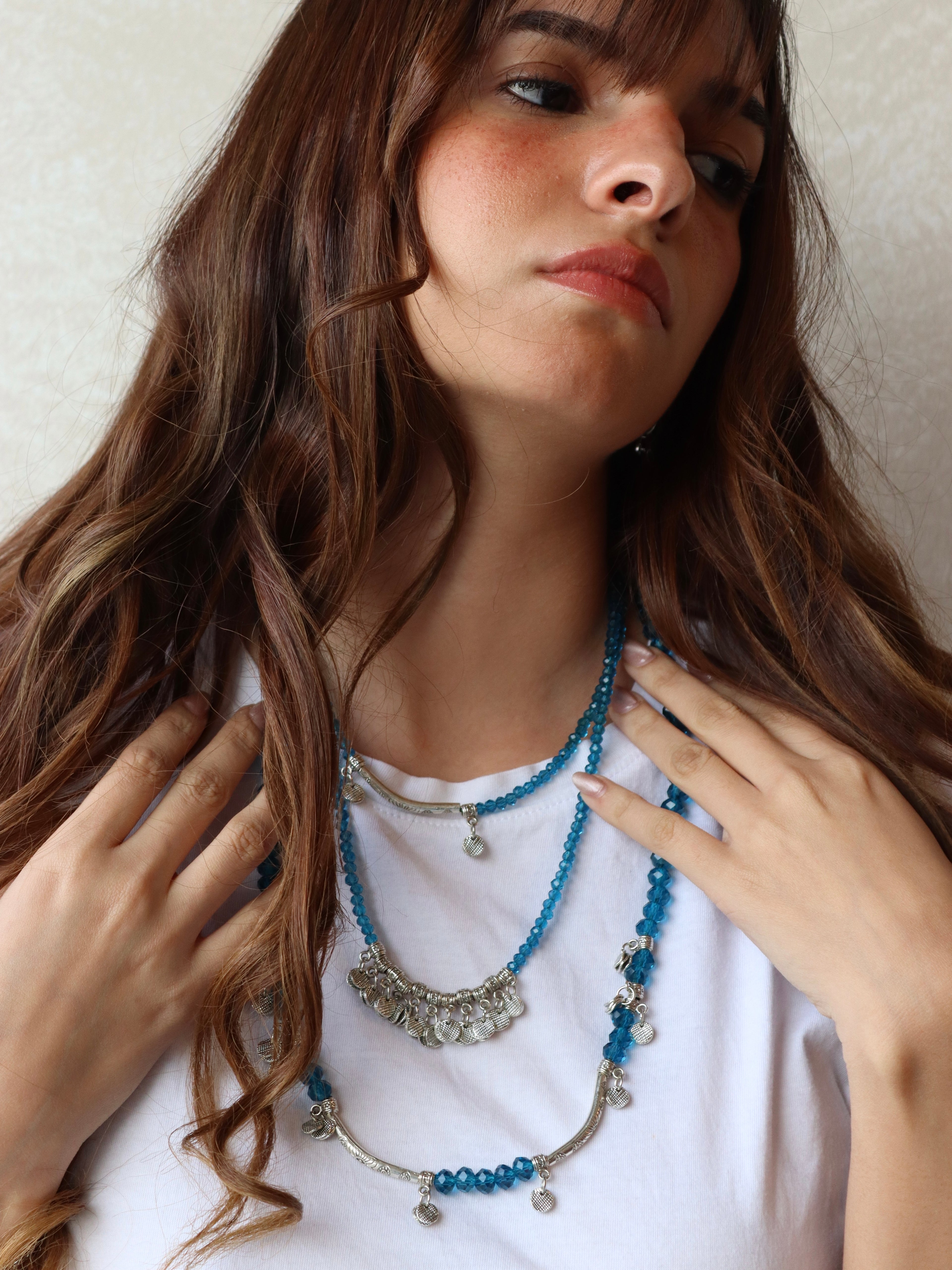 blue crystal layered necklace with silver metal