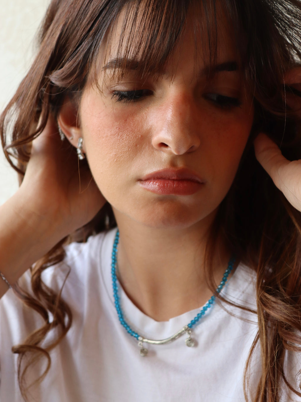 blue crystal layered necklace with silver metal