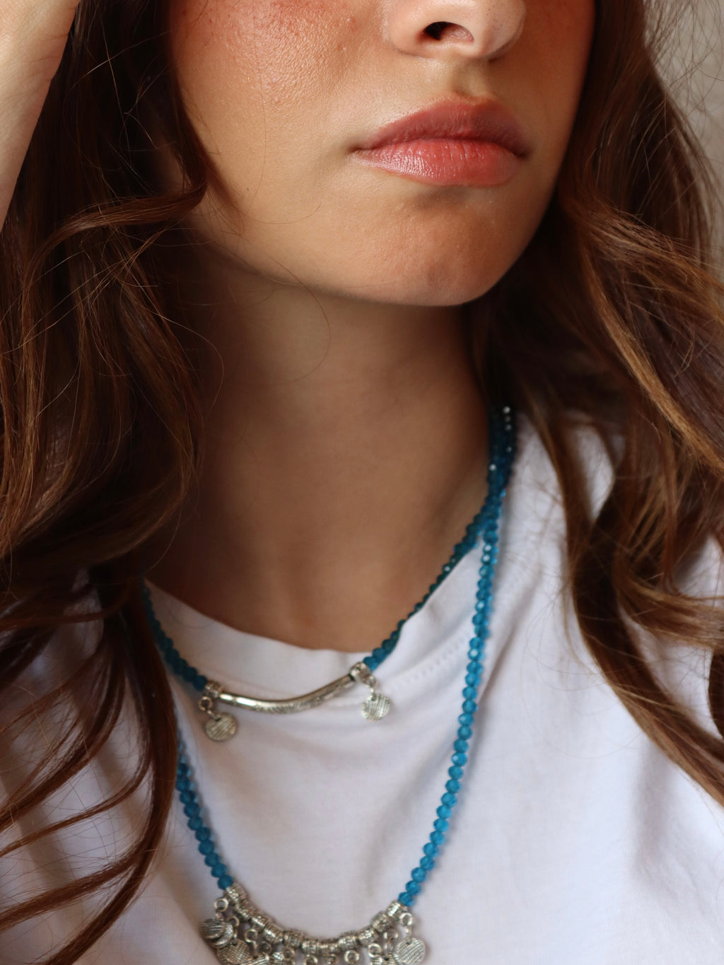blue crystal layered necklace with silver metal