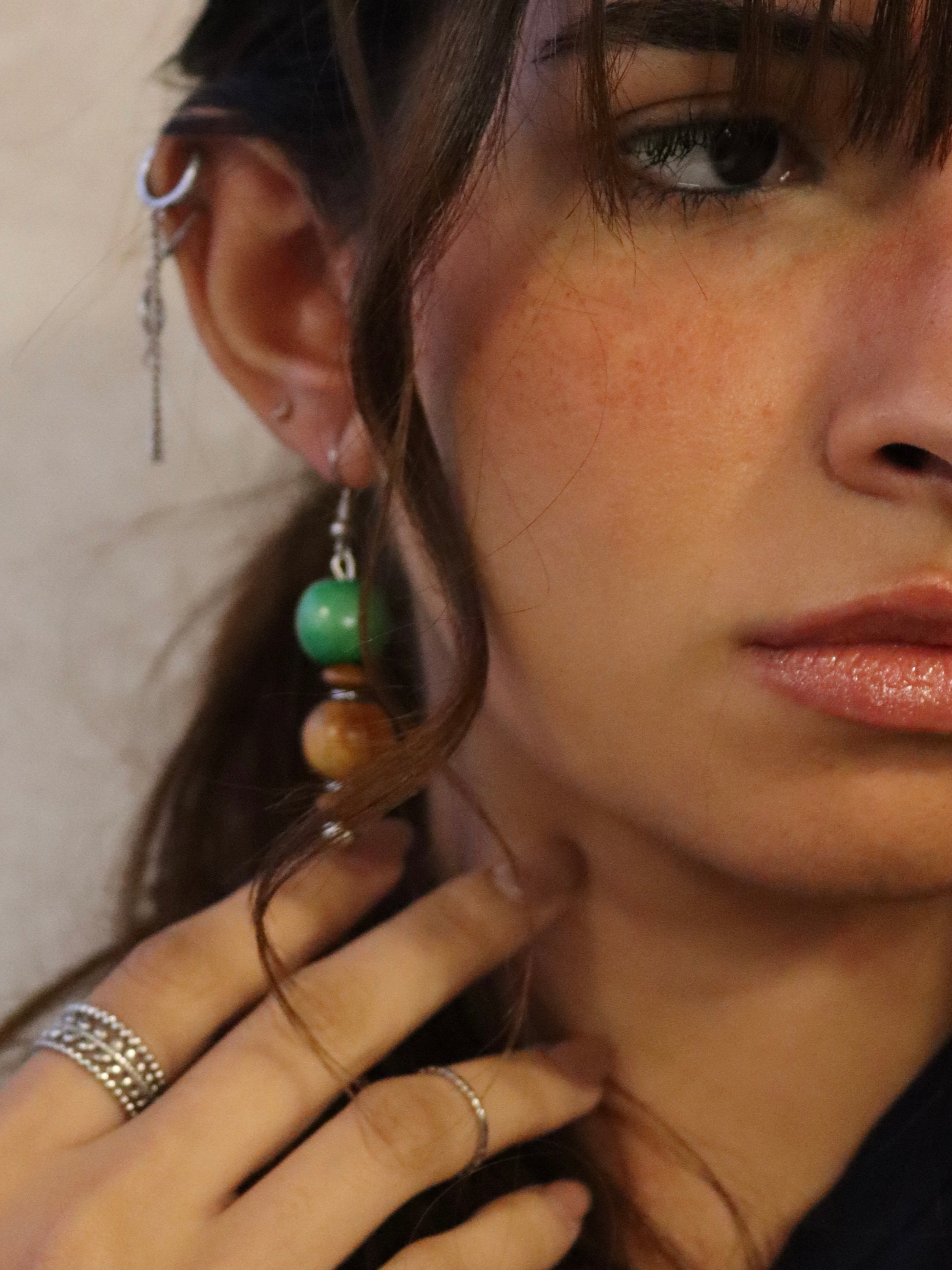 green & brown wooden earrings