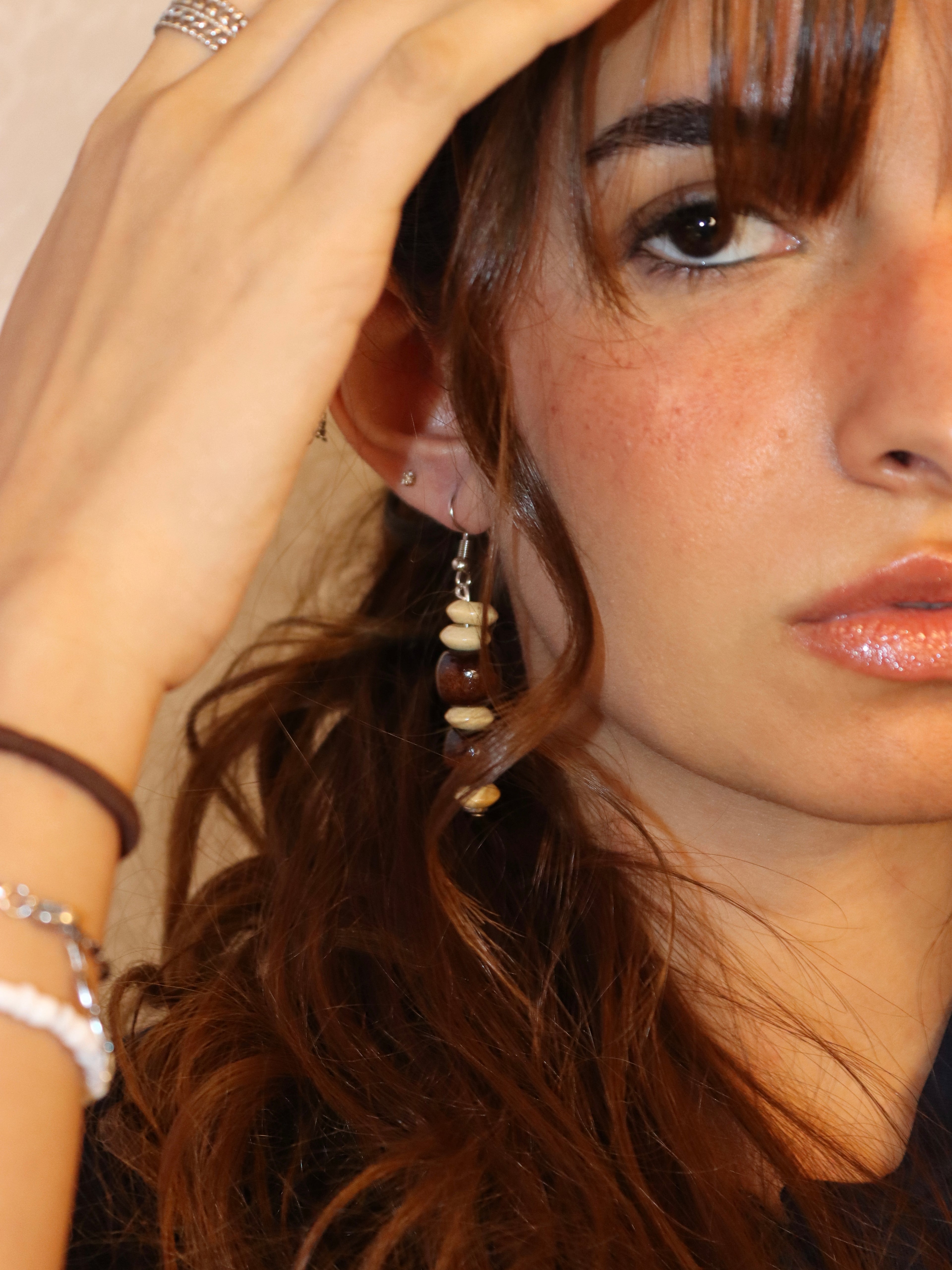 brown wooden earring