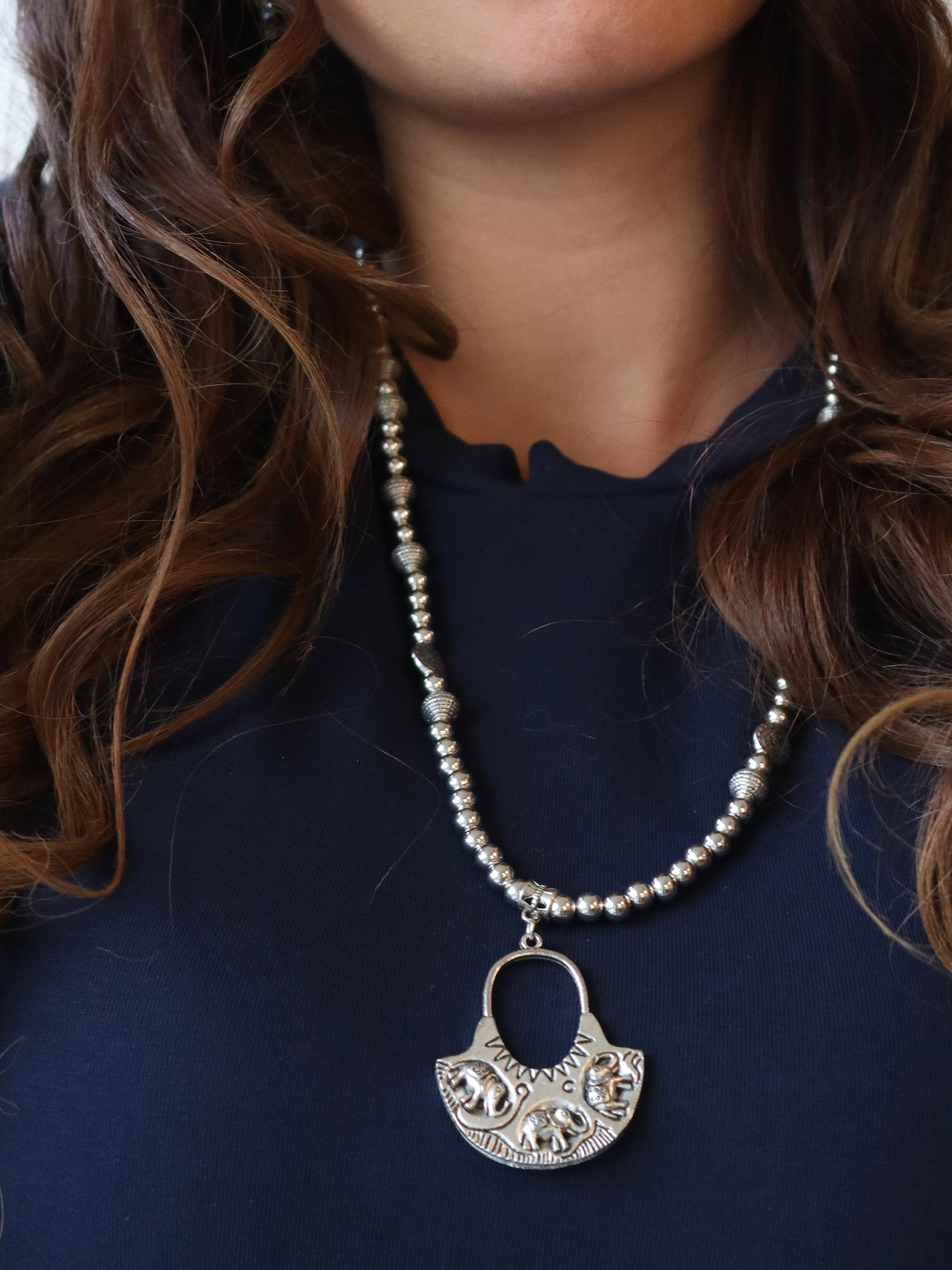 silver necklace with silver elephant pendant