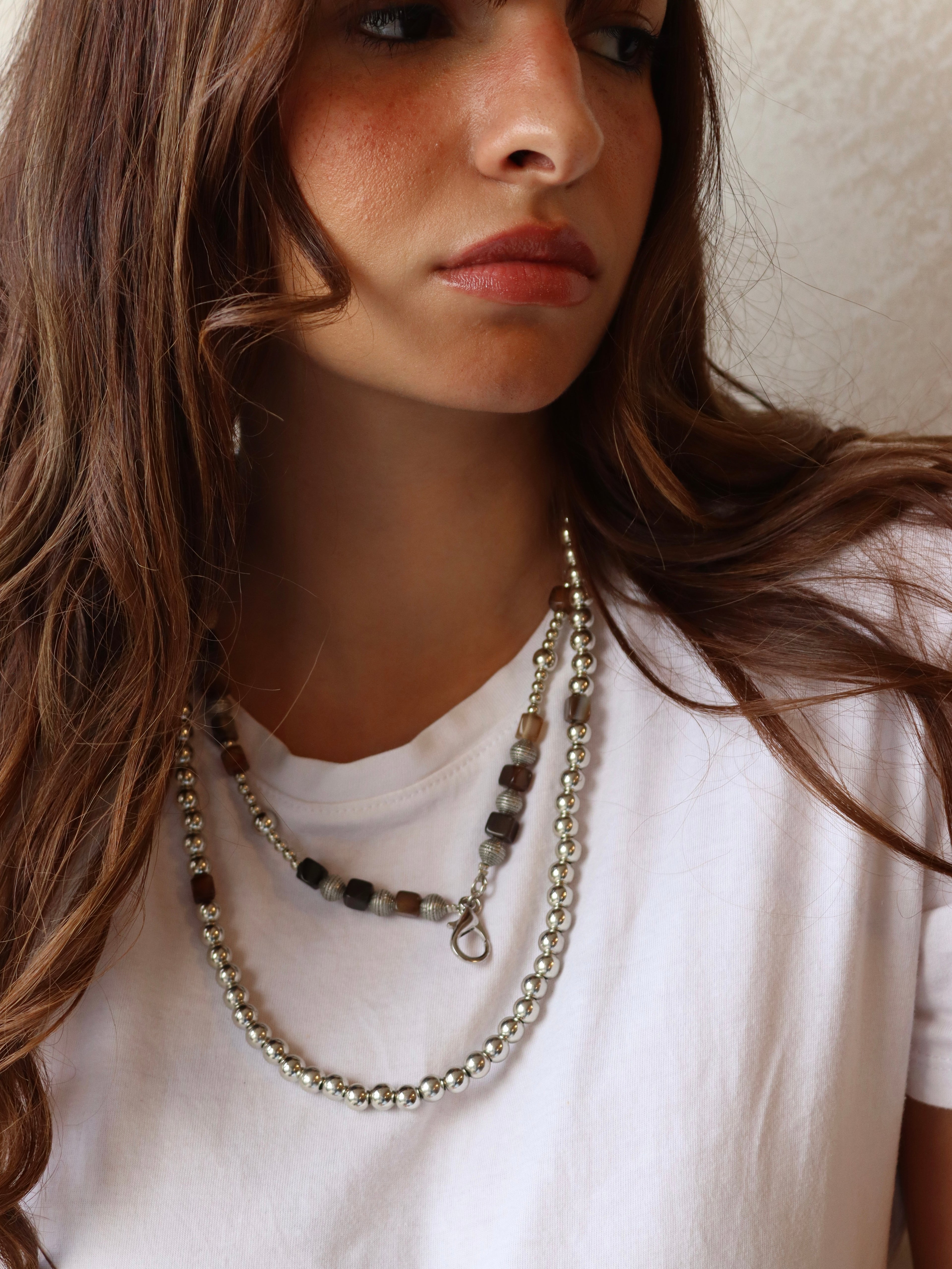 agate and silver metal mobile chain