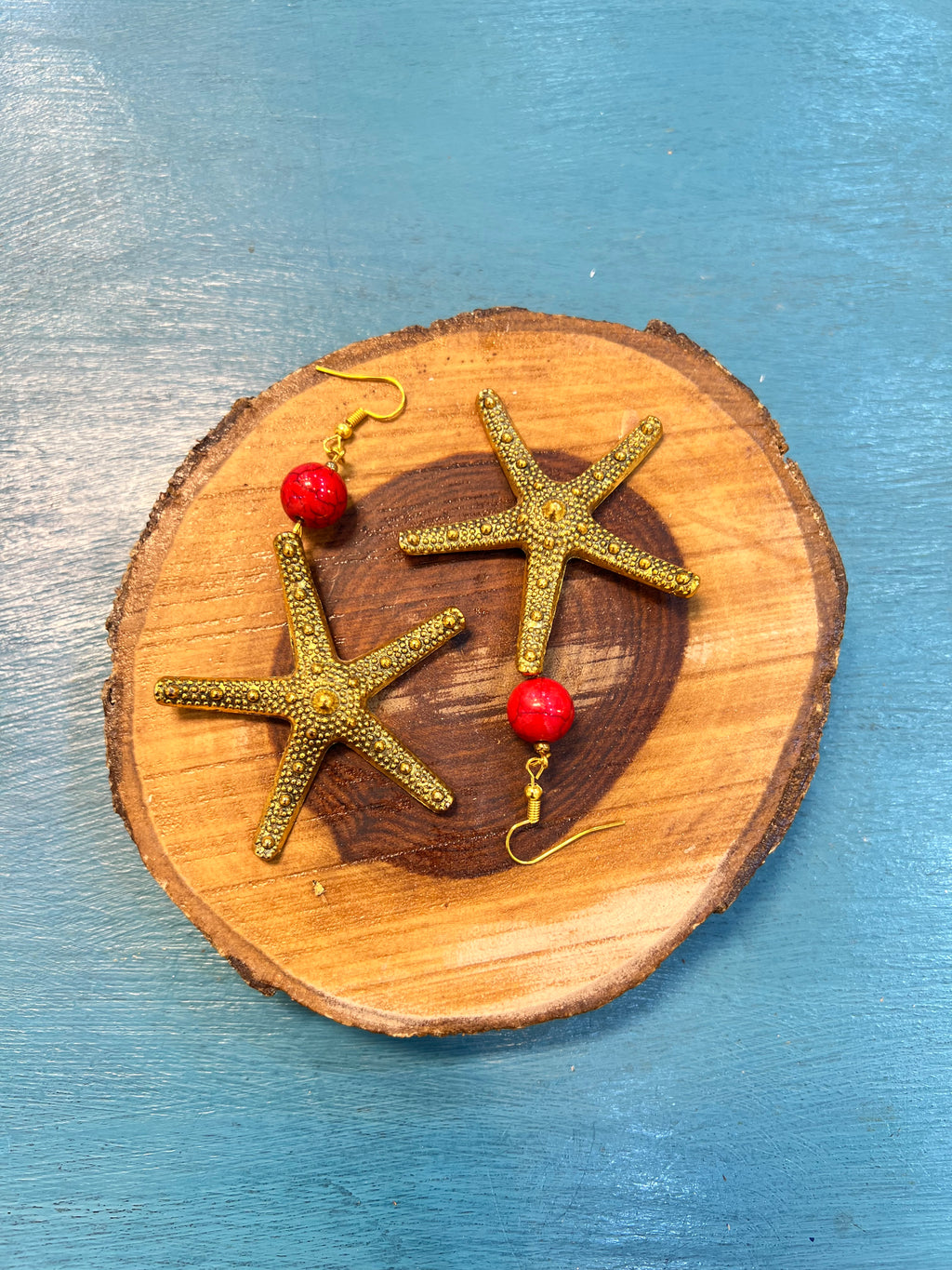 golden star fish earrings | J233