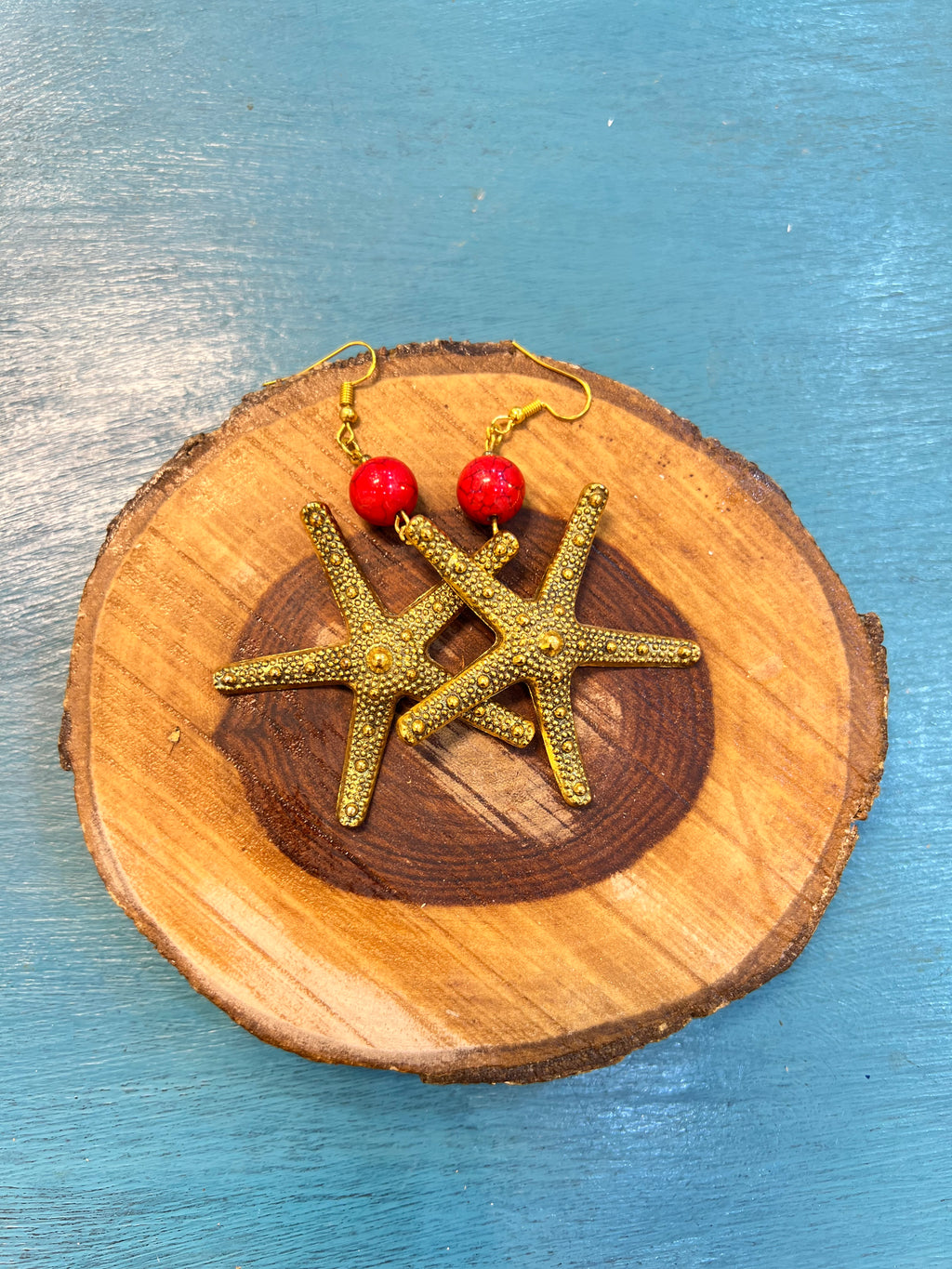 golden star fish earrings | J233