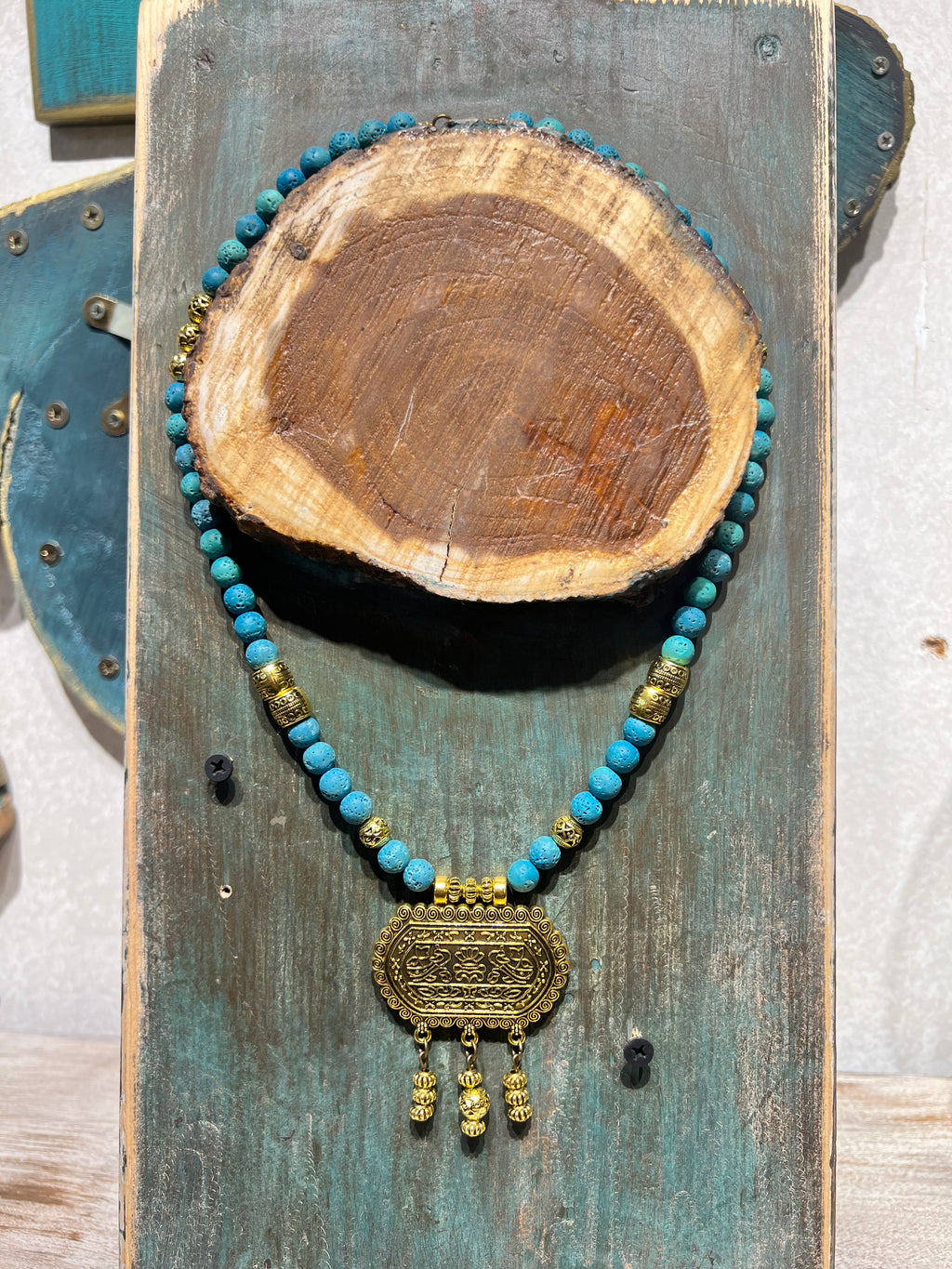 turquoise lava necklace with gold pendant | J249